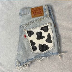 Cow print 501 Levi shorts